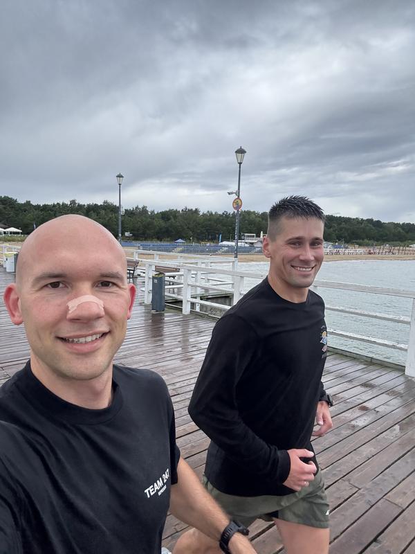 Team on the pier after a run